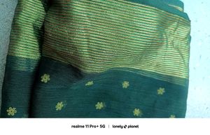 Elegant Dark Green Saree with Golden Accents