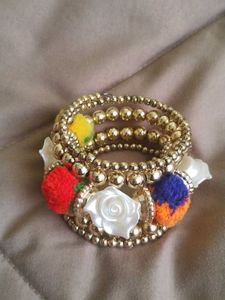 Gold Tone Flower Bangle