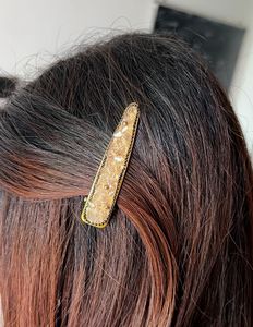 golden crystal studded clip