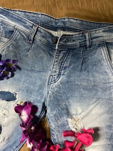 Ripped Jeans with Striped Detail
