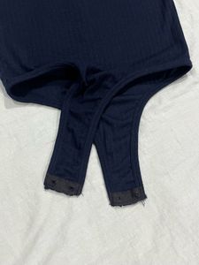 Sleeveless Mock Neck Ribbed Bodysuit