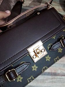 Stylish Brown Crossbody Bag with Monogram Strap