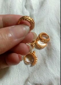 Elegant Gold-Tone Hoop Earrings per piece 150rs