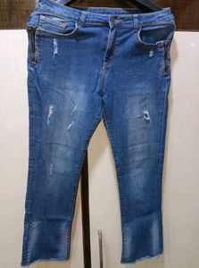 Ripped Blue Denim Jeans