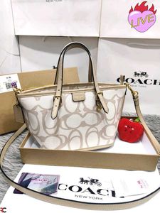 COACH* *TAXI TOTE BAG 21 IN SIGNATURE CANVAS*