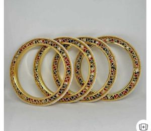 Elegant Gold &amp; White Bangles