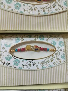 Peacock Feather Rakhi