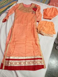 Elegant Orange kurti Set with Embellishments