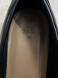 Classic Black Loafers with Gold Buckle
