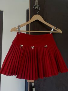 Red Pleated Skirt with Bows