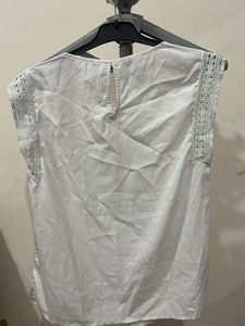 Chic White Sleeveless Top with Lace Detail