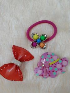 2 Hair clips and 1 flower rubber band
