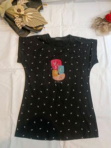 Chic Black T-Shirt with Artistic Detail