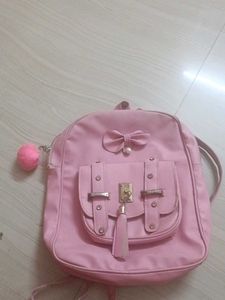 Cute Pink Bow Backpack and black purse
