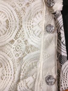 A Net Jacket With Button Closure