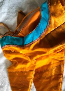 Stunning Teal Saree with Gold Accents