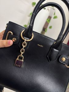 Chic Black Aldo Handbag with Lock Detail