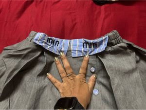 Pleated Skirt with Striped Waistband