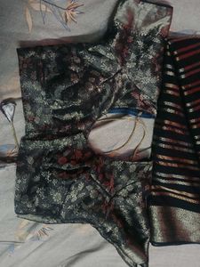 Elegant Black Saree with copper and silver Accents
