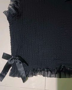 Chic Black Smocked Top with Bow Accent