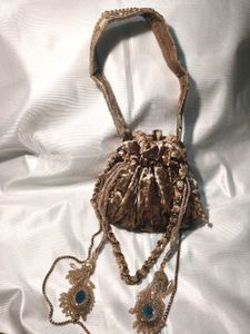 Elegant Embellished  velavte tassels Potli Bag