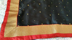 Elegant Black Saree with Gold &amp; Red Border