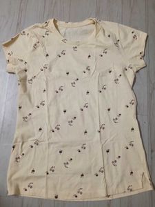 Peach coloured short sleeved tshirt