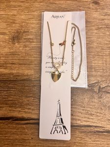 Elegant Gold Shield Pendant Necklace