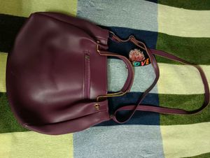Chic Purple Handbag with Bow Accent