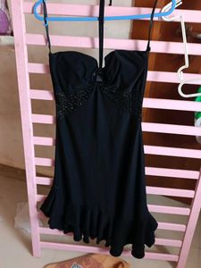 Chic Black Halter Dress with Ruffle Hem