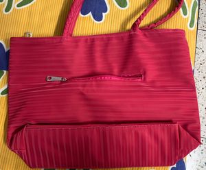 Brand new spacious sidebag or handbag in Rani pink or fusia pink colour