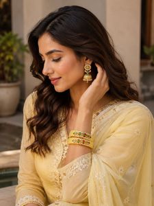 Beautiful Yellow Bangles with Stone Work