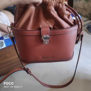 Brown Drawstring Bucket Bag , slight peeling