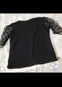 Chic Black Top with Polka Dot puff Sleeves