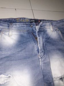 Distressed Blue Denim Jeans