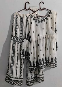 New Embroidered Peplum Set