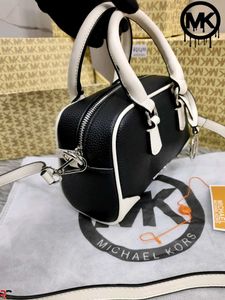 MICHAEL KORS**THOMPSON EXTRA-SMALL CONVERTIBLE CRO