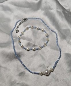 Delicate Pearl Necklace with Gold Accent