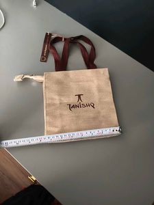 Tanishq Pouch Bag small