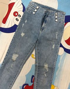 High Weist Light Wash Ripped Jeans