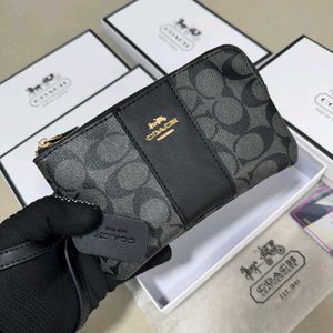 COACH Small Wristlet in Signature Canvas WD BOX