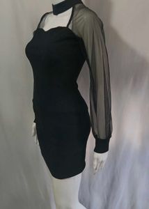 Vogue Small Chic Black Sheer Sleeve Dress
