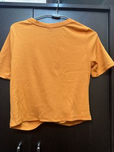 Trendy Orange Twisted Crop Top