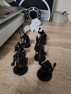 collection of seven hero miniatures,