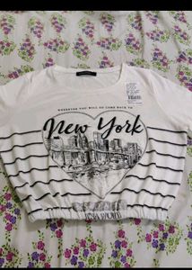 white top ...no bargaining in coin