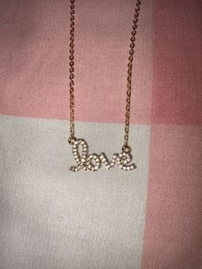 Gold-Tone Crystal "Love" Pendant Necklace