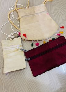 Embroidered Clutch with Tassels