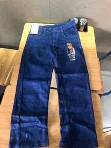Blue Wide Leg Jeans with Bear Patch