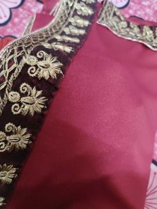Elegant Maroon Saree with Gold Embroidery