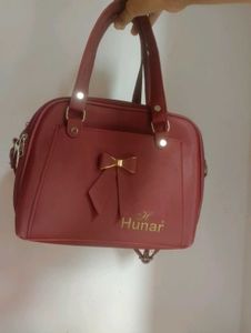 Chic Burgundy Handbag with Bow Accent